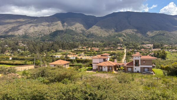 Rural countryside with traditional houses and mountain views on the outskirts of Villa de Leyva