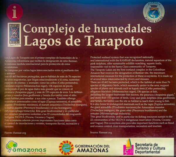 Informational sign about the Tarapoto Wetlands, showcasing details on local ecology and tourism in Puerto Nariño, Amazonas, Colombia.