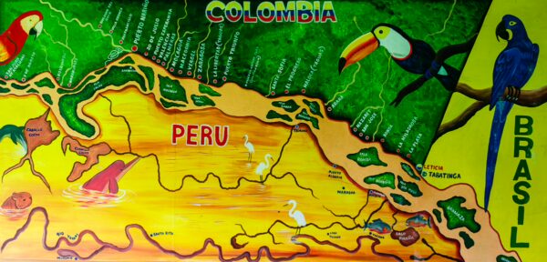 Colorful map display featuring Peru, Colombia, and Brazil, with prominent tropical birds and waterway details.