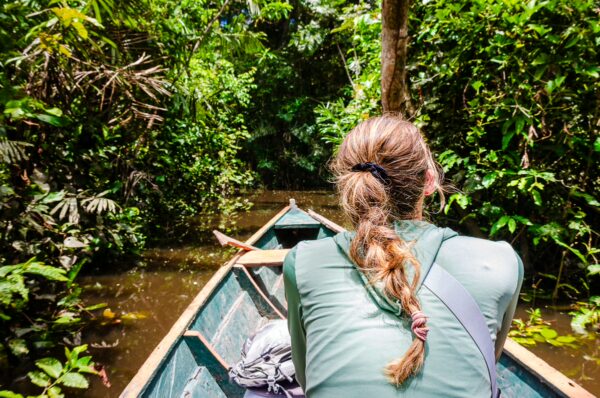 Exploring the lush greenery of Gamboa Nature Reserve in Loreto, Peru, while paddling through tranquil waters.