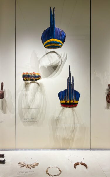 Colorful traditional crafts displayed at the ethnographic museum in Leticia, Amazonas, Colombia, highlighting indigenous artistry.