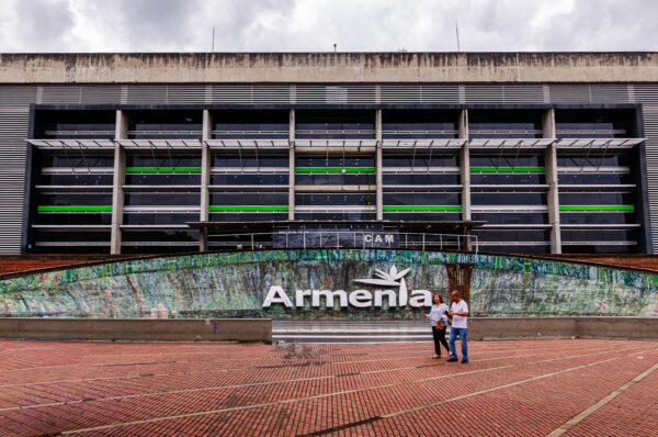 Modern architecture of the Alcaldía with vibrant green accents and the name "Armenia" prominently displayed in Armenia, Quindío, Colombia.
