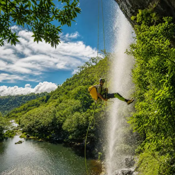 Canyoning adventure beside a waterfall in Mauritius